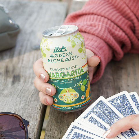 Person holding Modern Alchemist Margarita Cannabis Infused Mocktail. Alcohol free.