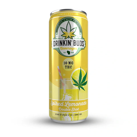 A tall, yellow can of Drinkin' Buds Spiked Lemonade featuring a cannabis leaf logo, 10mg THC labeling, and an image of a lemonade drink with ice and a straw.