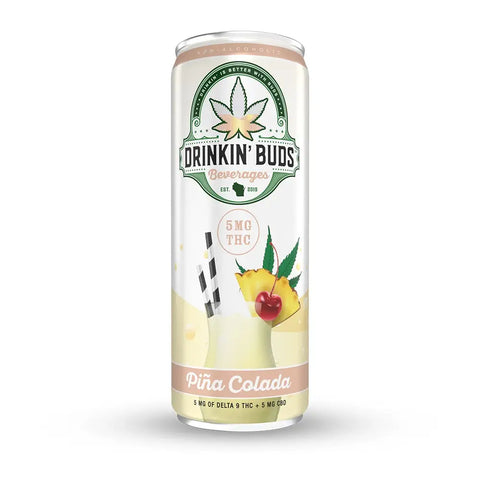 A can of Drinkin' Buds Piña Colada beverage featuring 5mg THC, with tropical fruit and cannabis leaf graphics on the label.