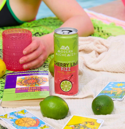 Cherry Lime Fizz Modern Alchemist Cannabis Infused Mocktail by the pool. Alcohol free.