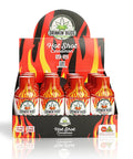 A retail display of Drinkin’ Buds Hot Shot Cinnamon shots, with nine small red bottles featuring flame designs arranged in a black and red tray. The label advertises 10mg THC and 10mg CBD per shot and includes a 21+ warning.