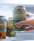 Grabbing Modern Alchemist Margarita Cannabis Infused Mocktail from the fridge. Alcohol free. 